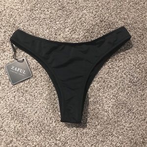 Black bathing suit bottoms